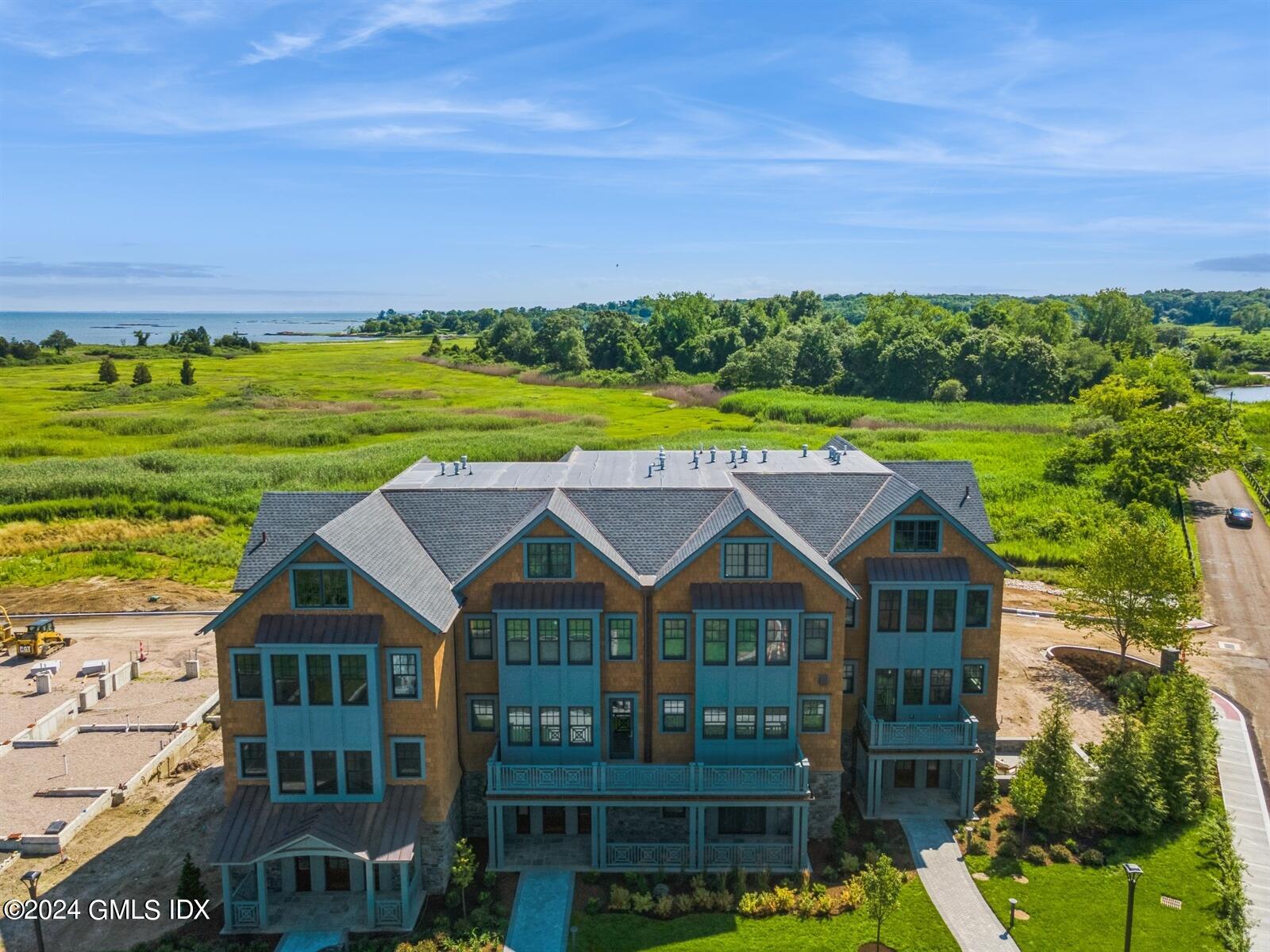 a aerial view of a house with a big yard