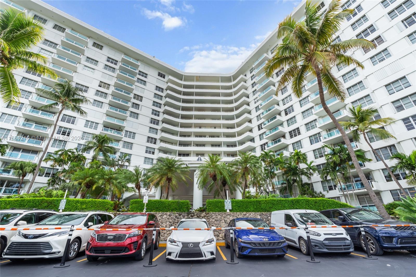 a cars parked in front of a building