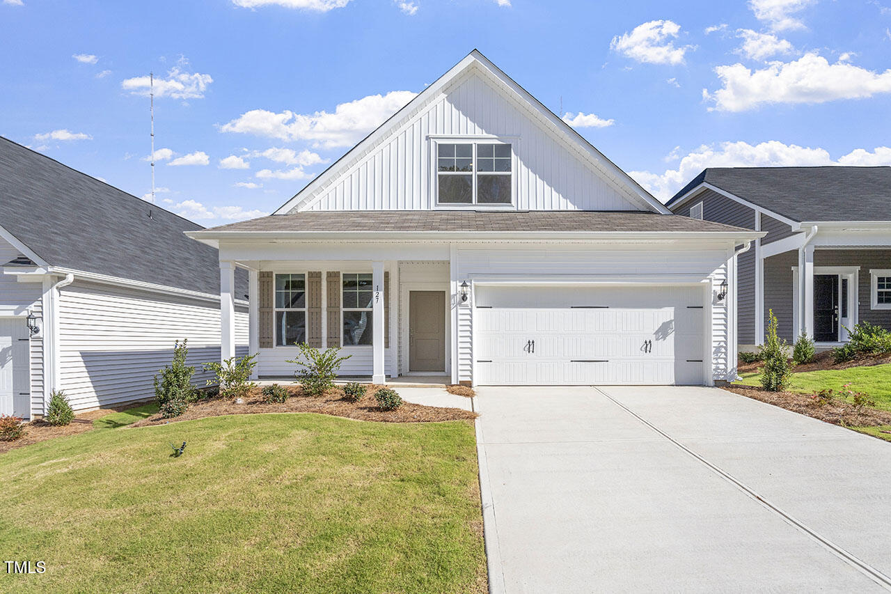 a very nice looking house with a large window