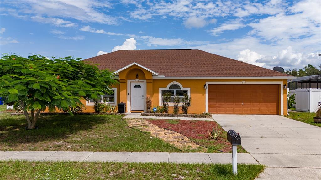 front view of house with a yard