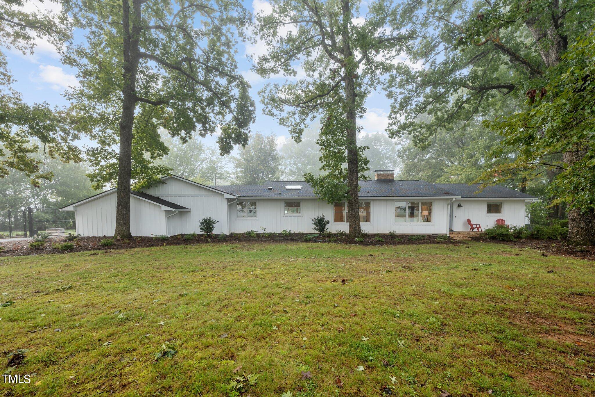 a house view with a garden space