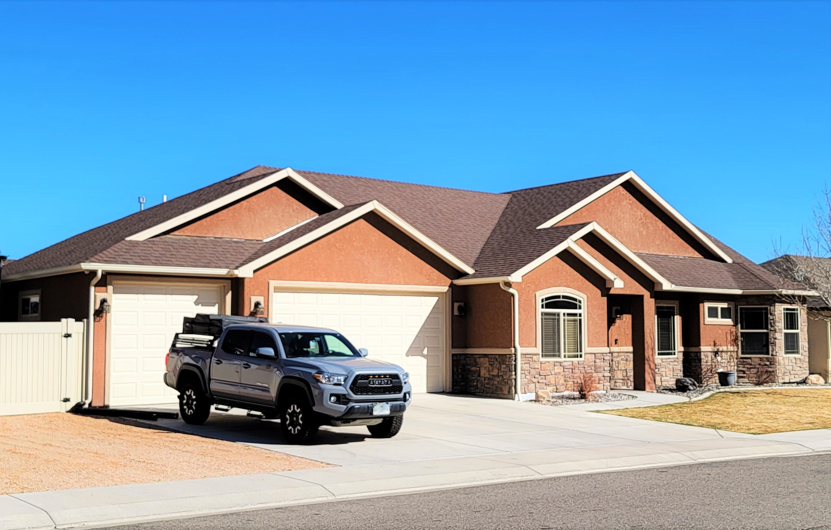 a car parked in front of a house