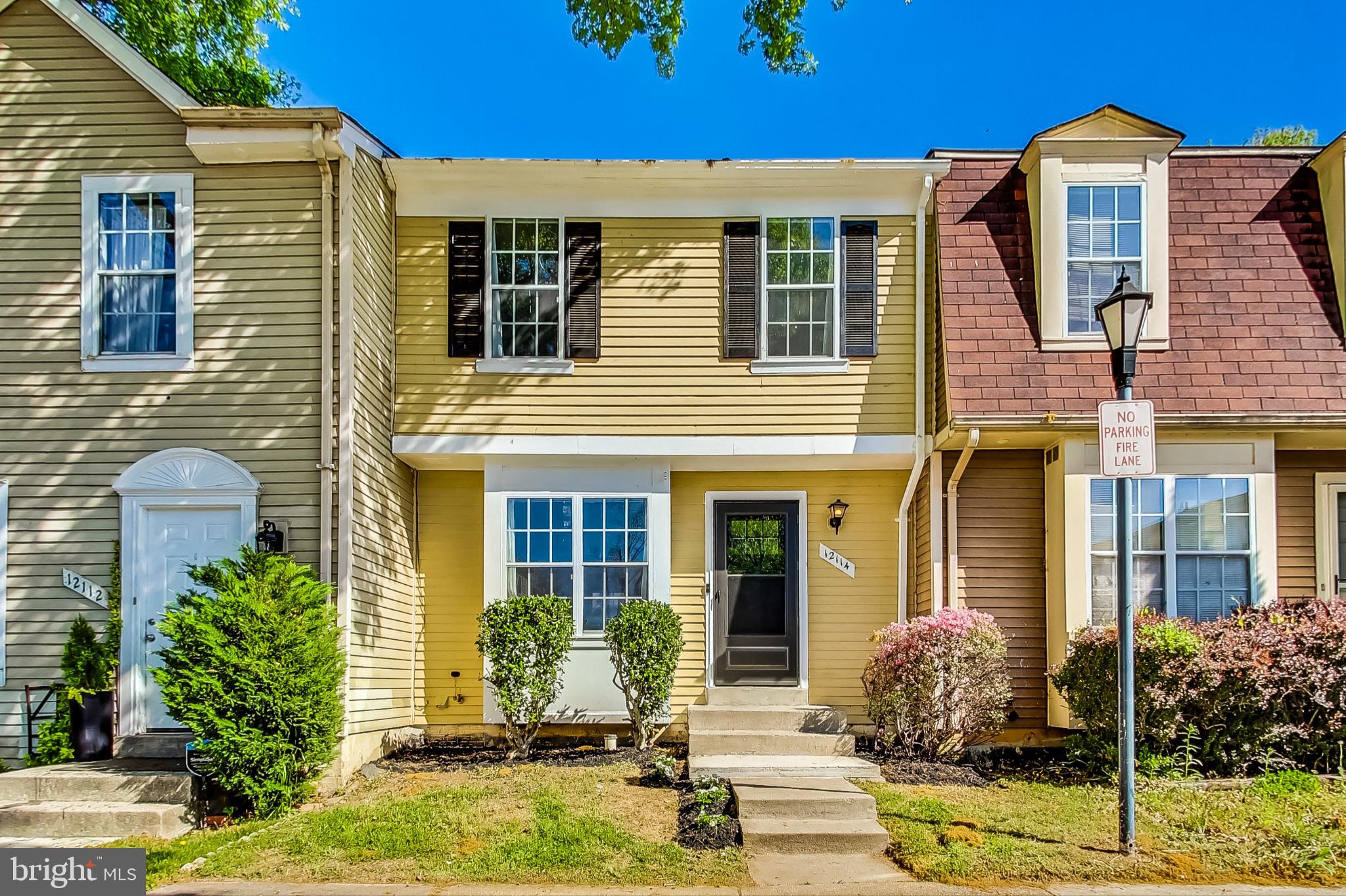 a front view of a house having yard