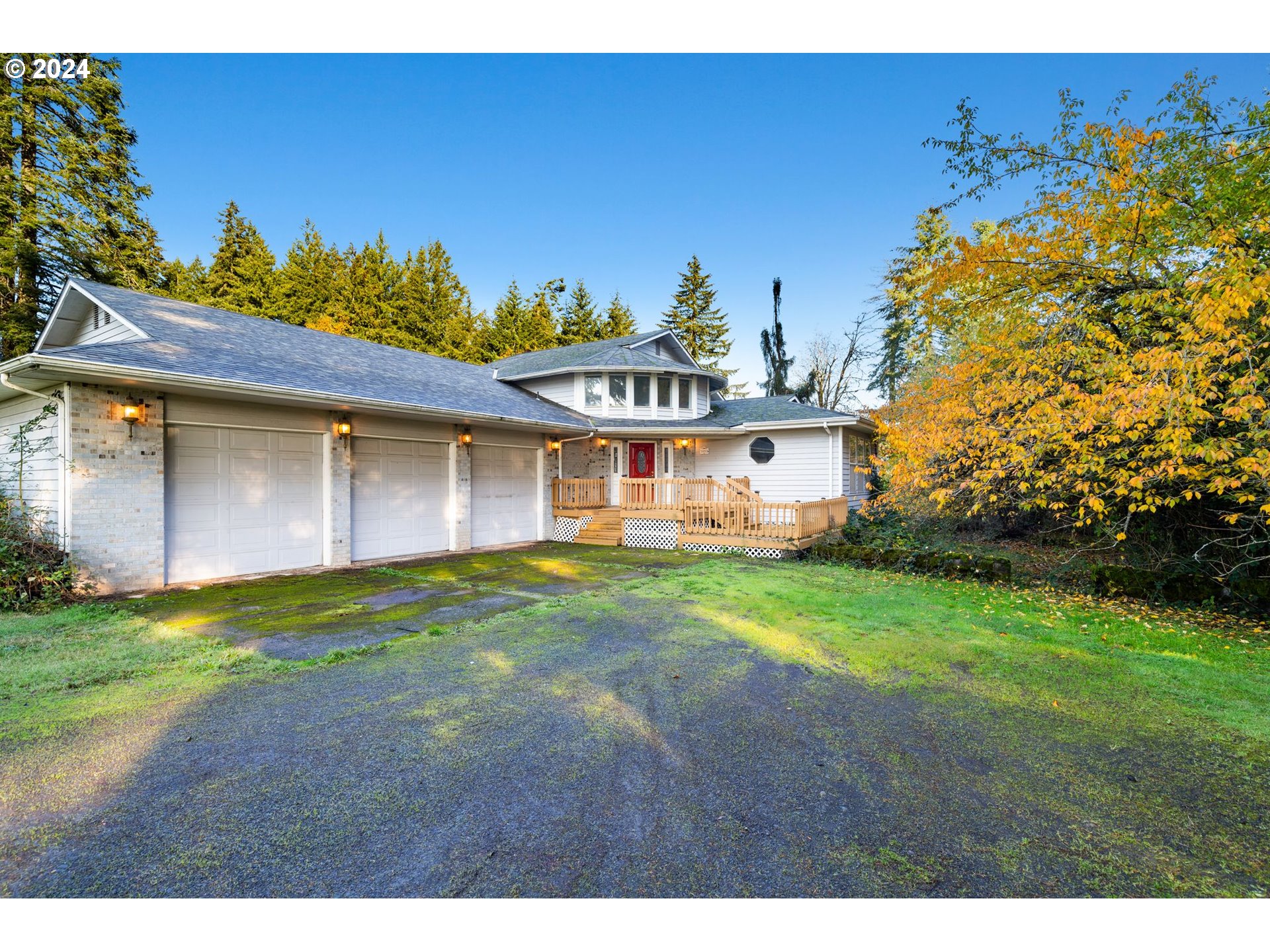 a view of a house with a big yard