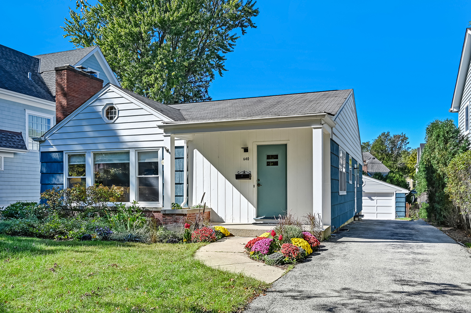 a front view of a house with a porch