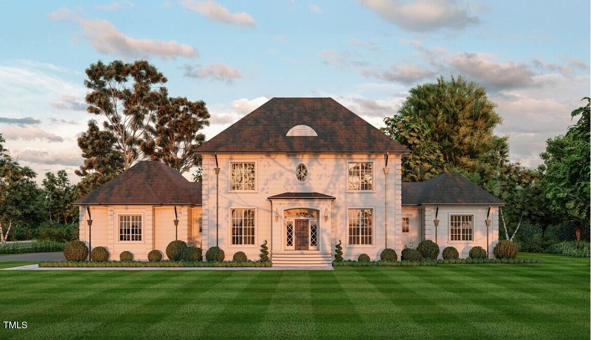 a front view of a house with a yard