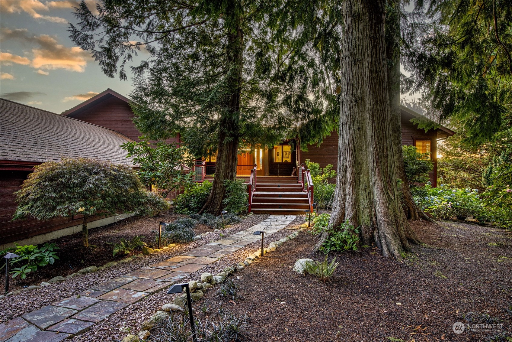 a backyard of a house with lots of green space