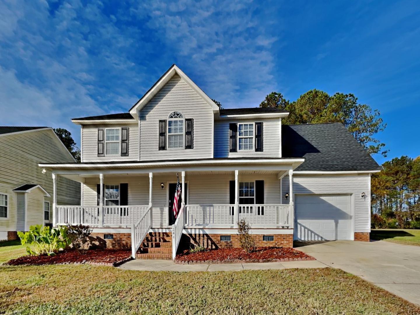 front view of a house with a porch