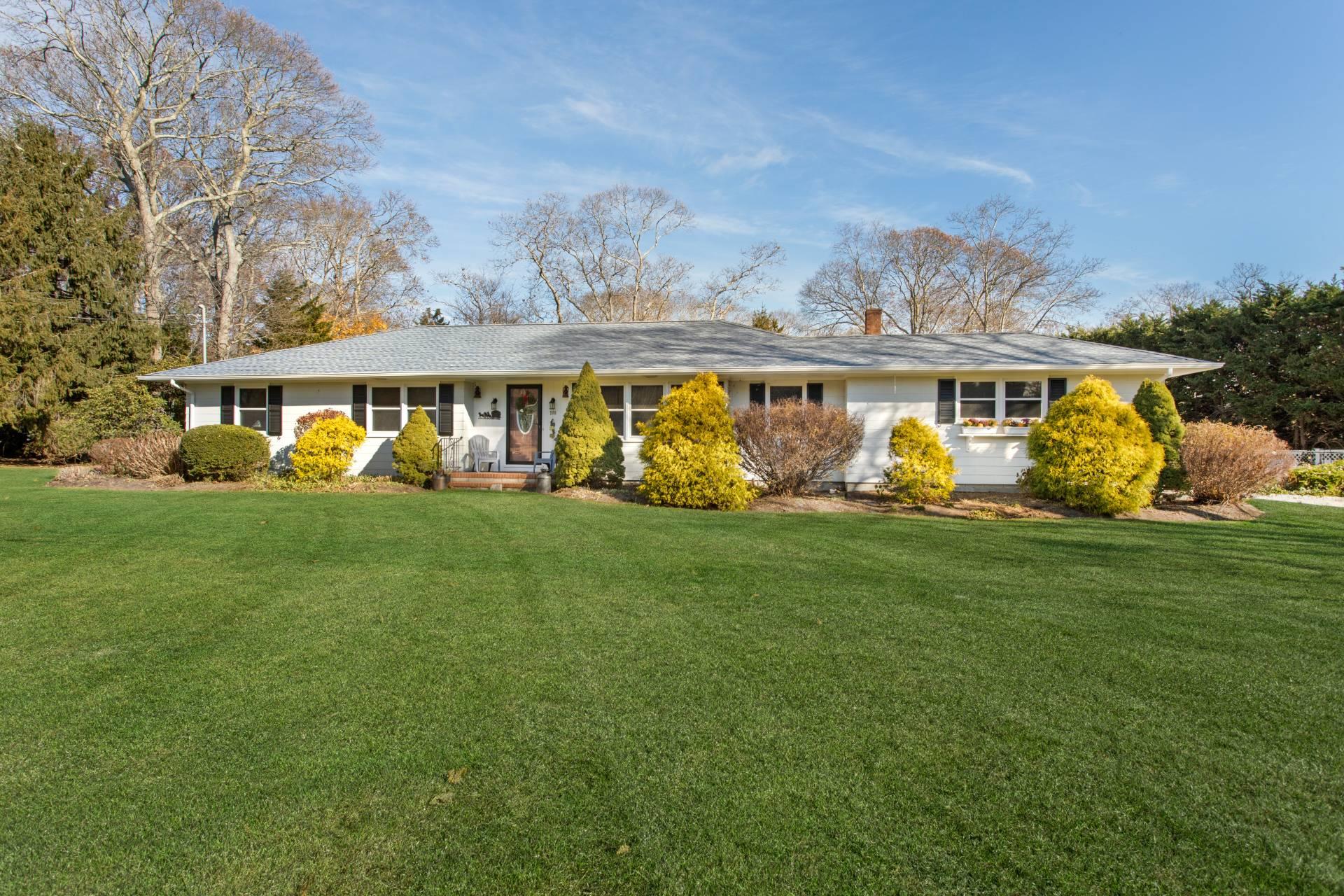 a side view of a house with garden