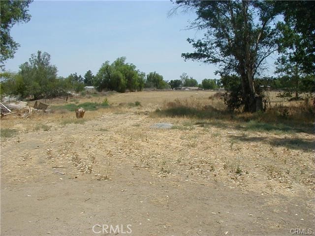 a view of a lake with a yard