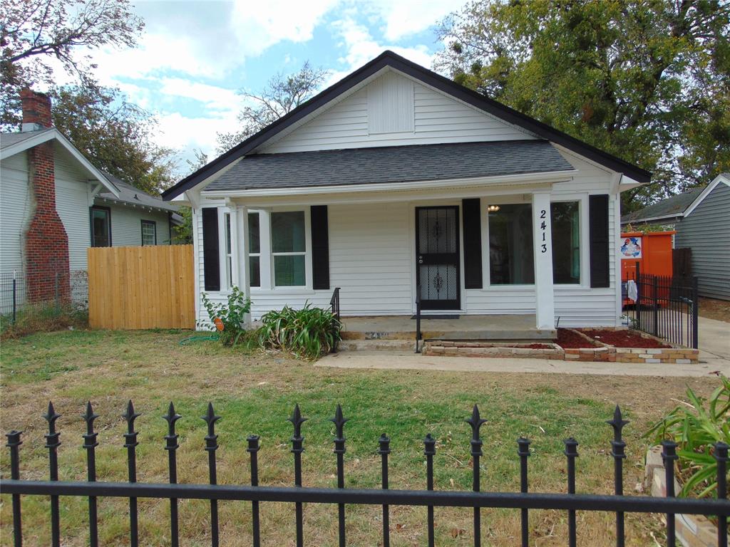 a front view of house with yard