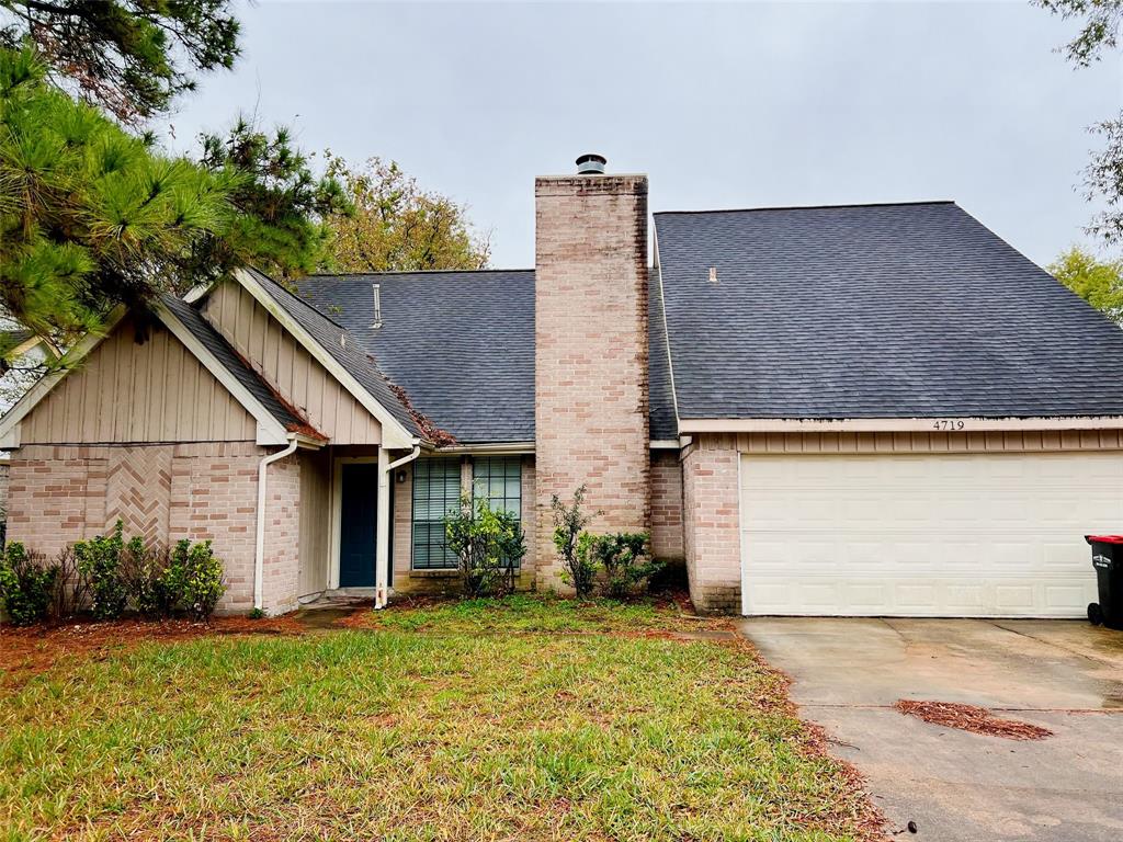 front view of house with a yard