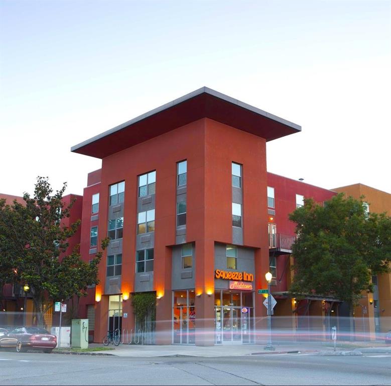 a front view of building with street