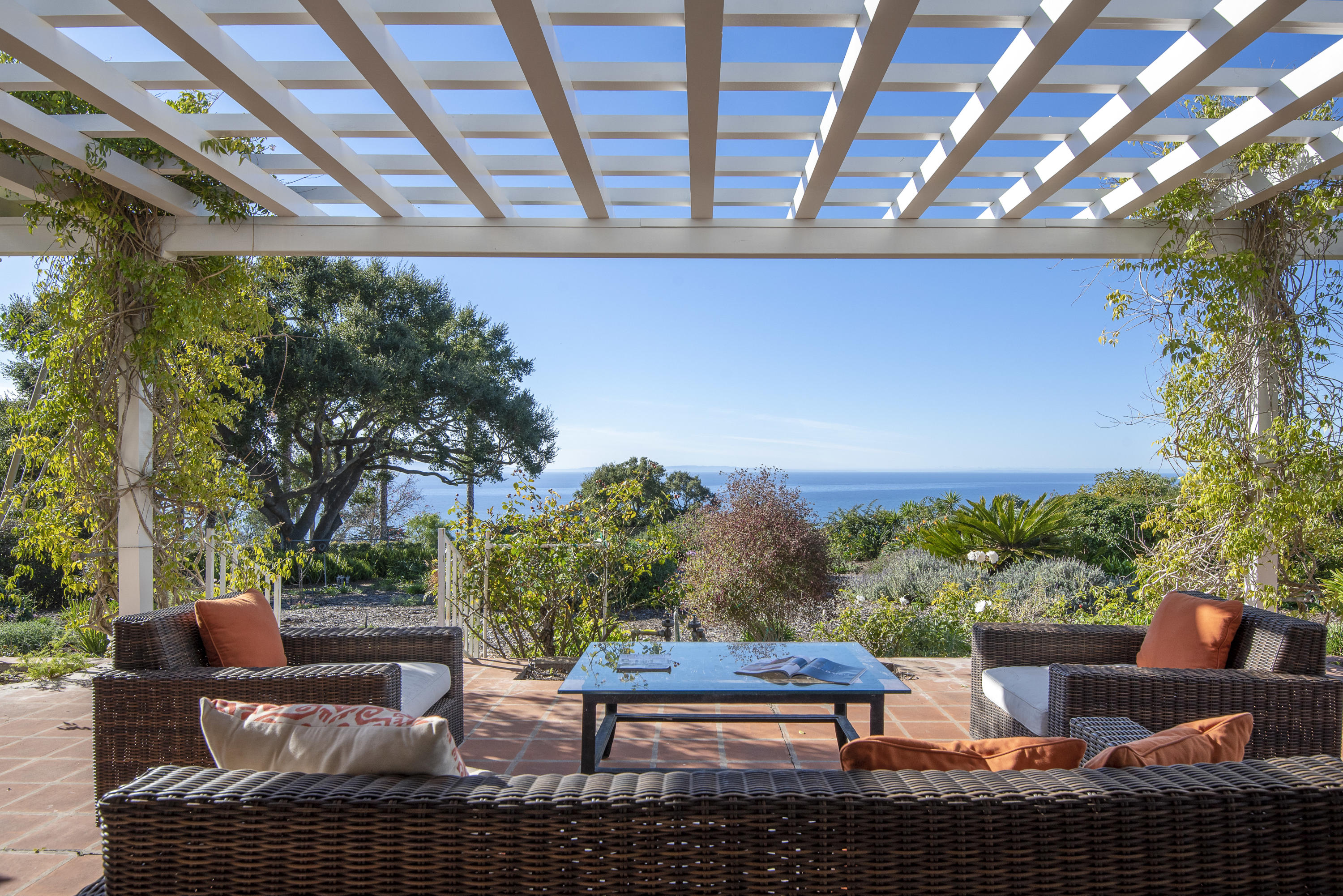 a outdoor living space with furniture and a fireplace