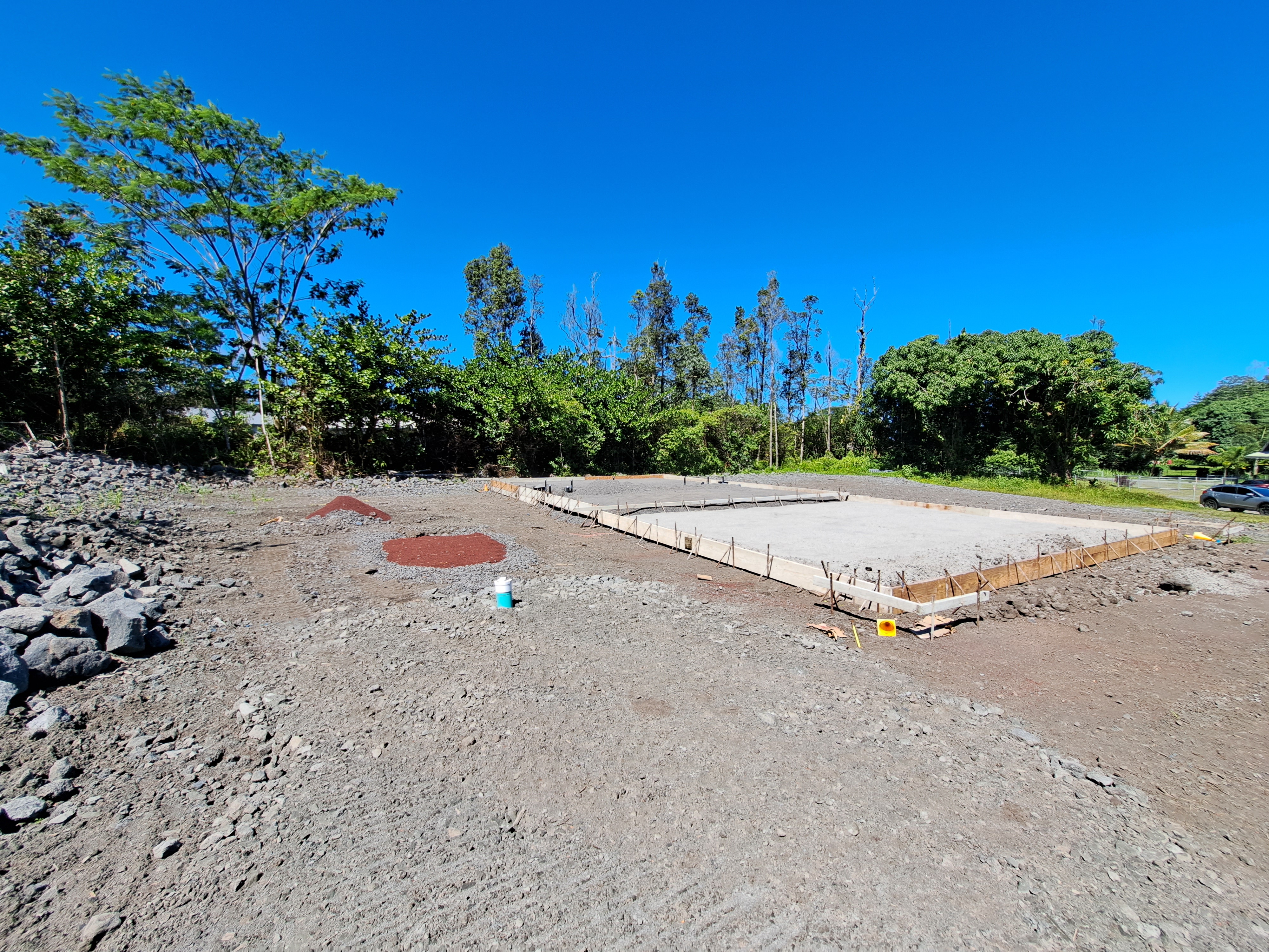 a view of a road with a building in the background