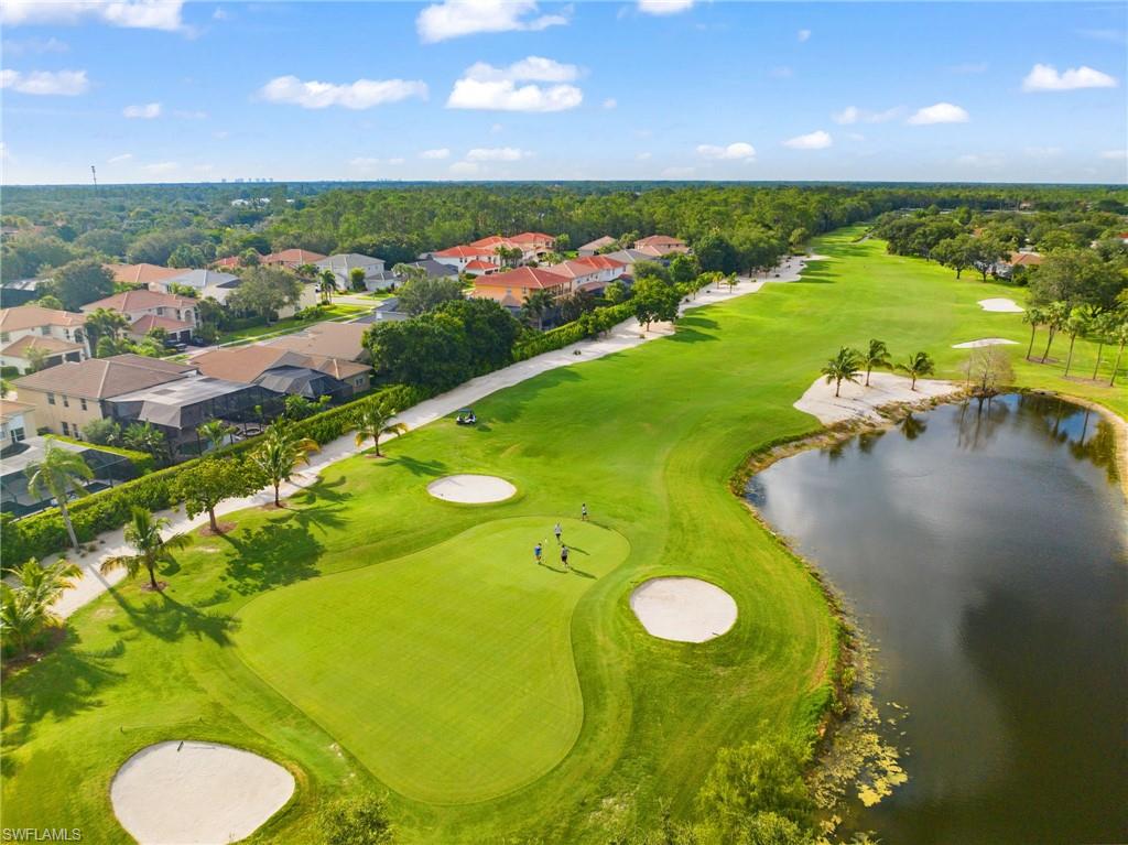 a view of a golf course with a swimming pool