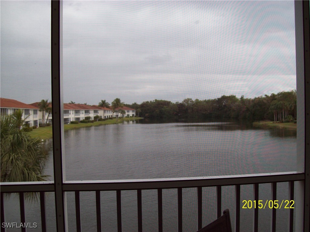 a view of a lake from a balcony