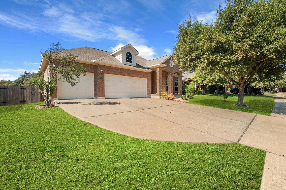 a front view of a house with yard