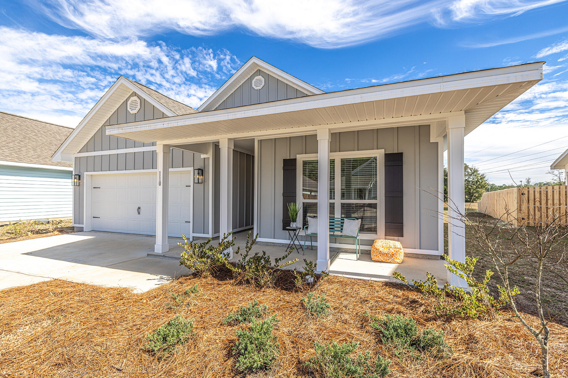 a front view of a house with a outdoor space