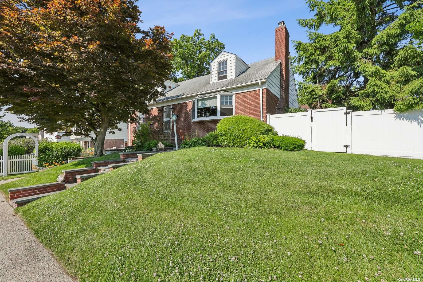 a view of a house with a back yard