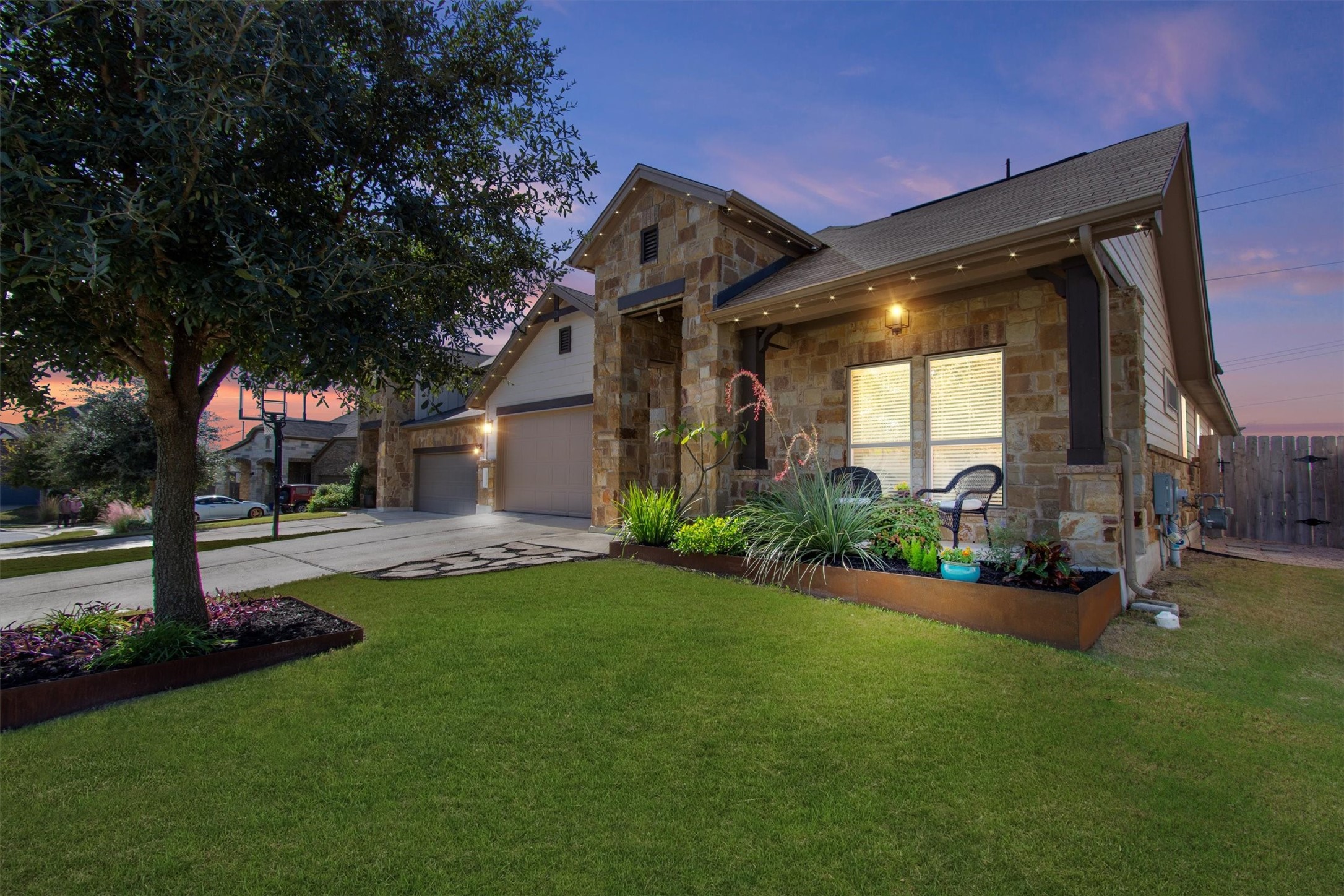 a front view of a house with garden