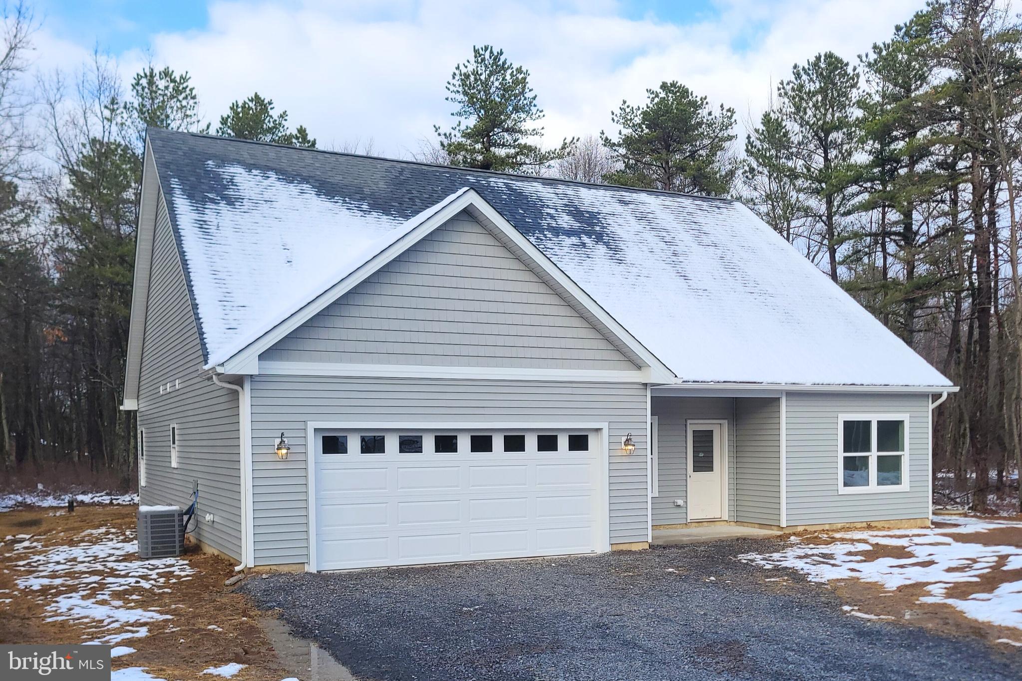 a front view of a house with a space