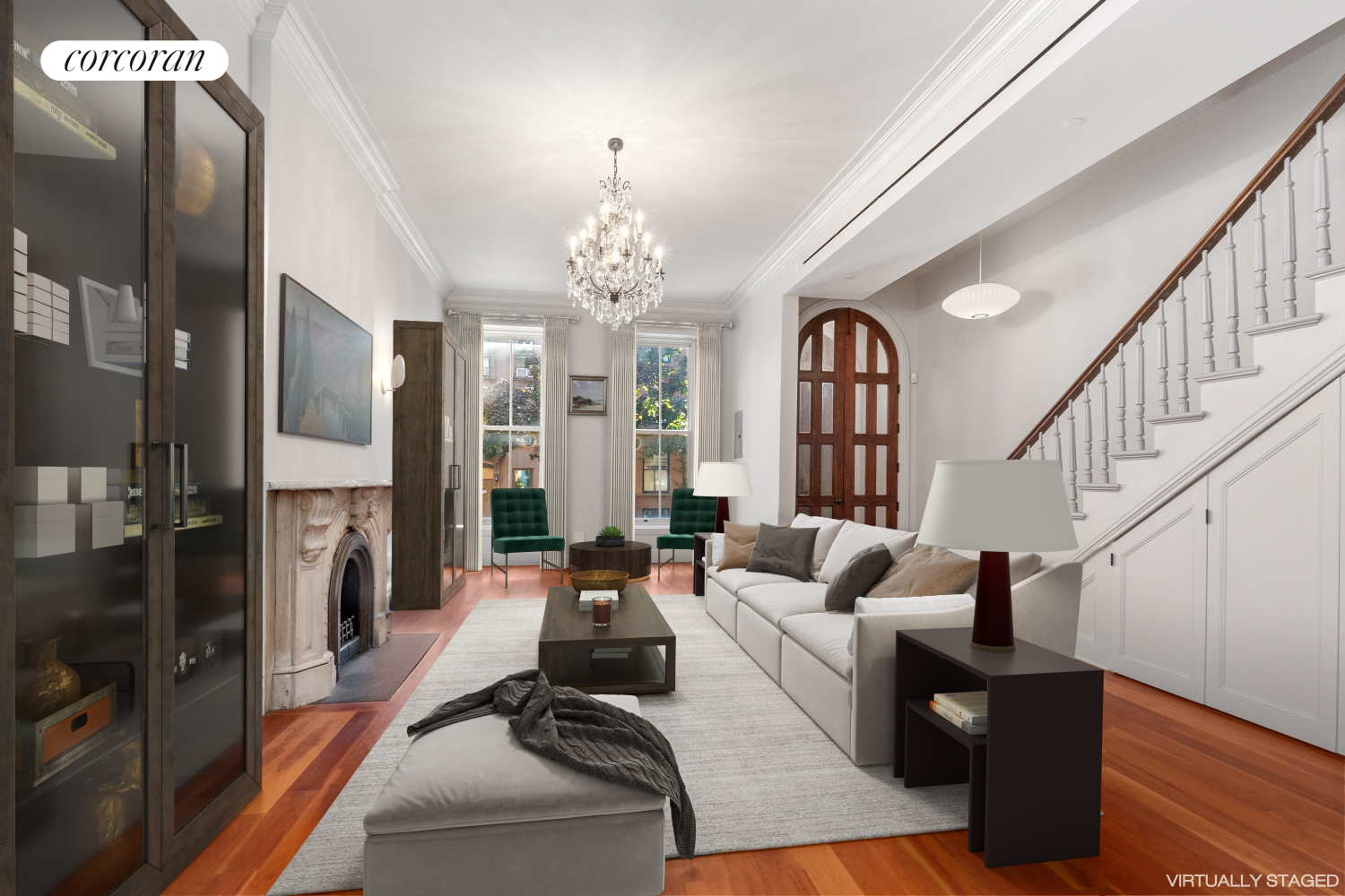 a living room with furniture and a chandelier