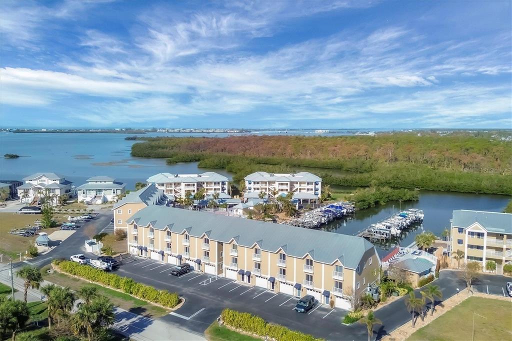 an aerial view of a house with a ocean view