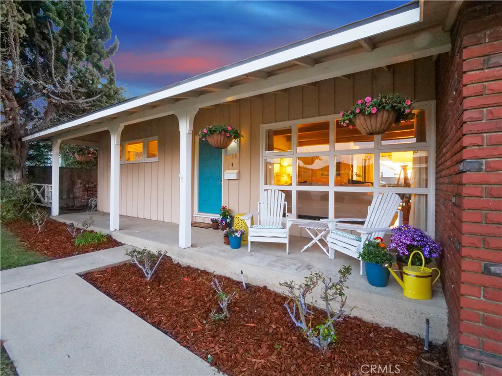 a front view of a house with a porch