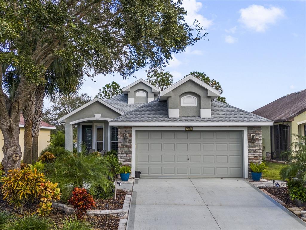 front view of a house with a small yard