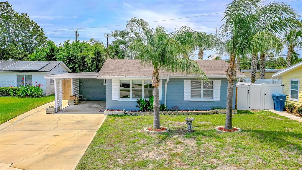 front view of a house with a yard