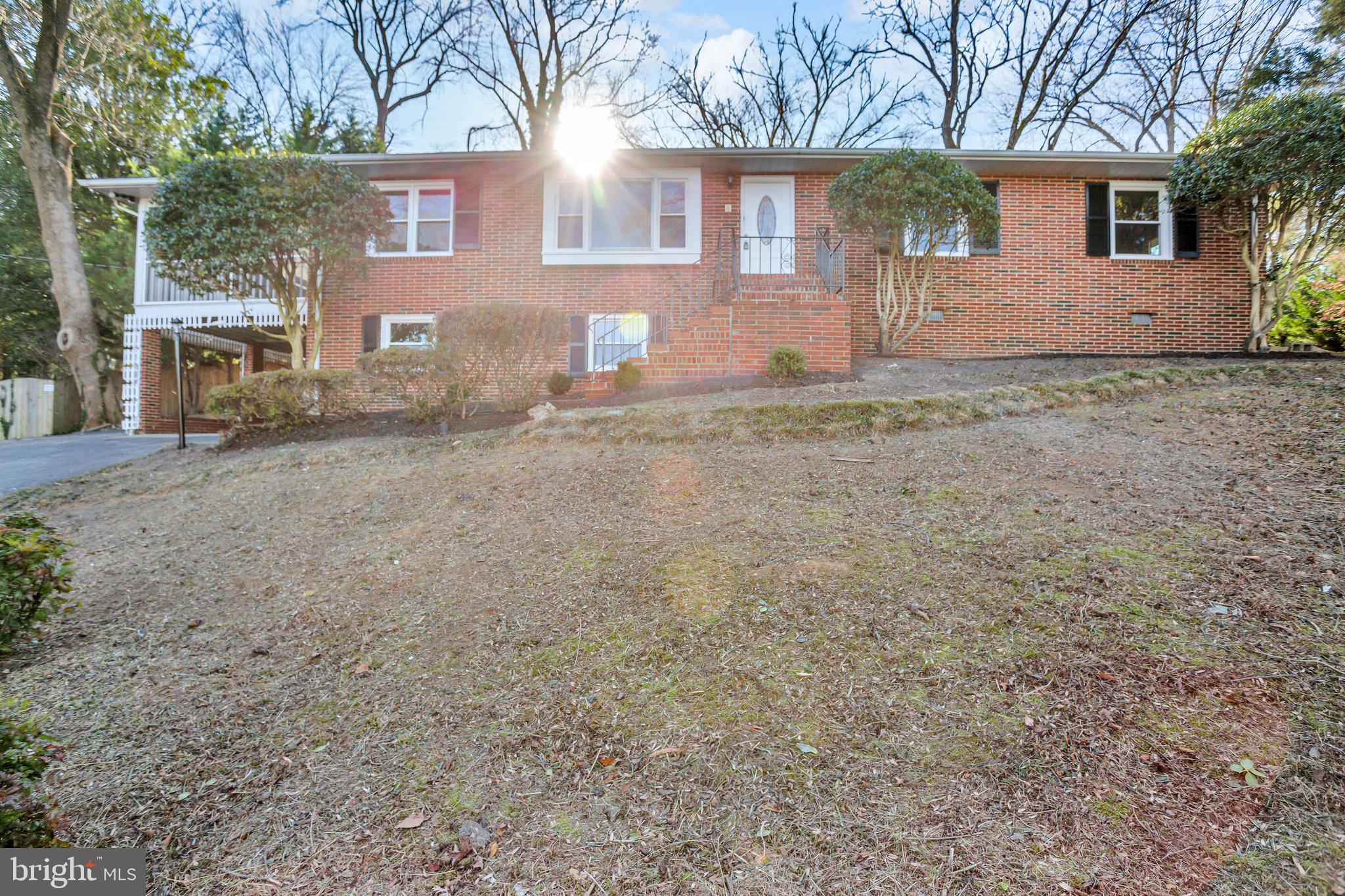 front view of a house with a dry yard