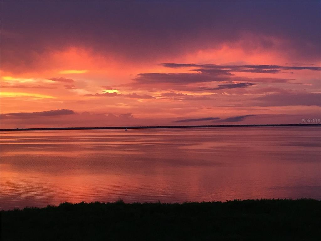 a sunset view with ocean view