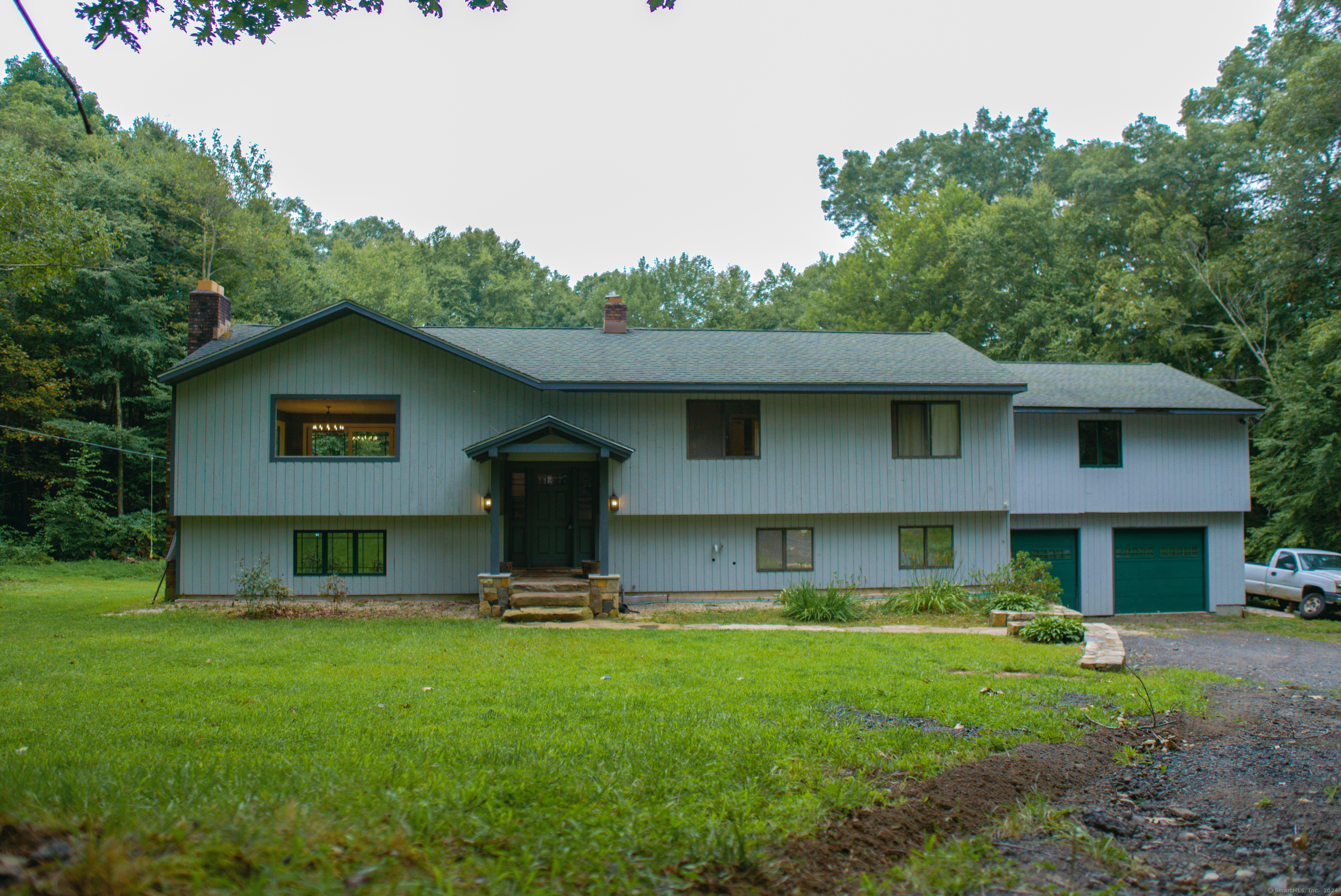 a view of a yard in front of a house