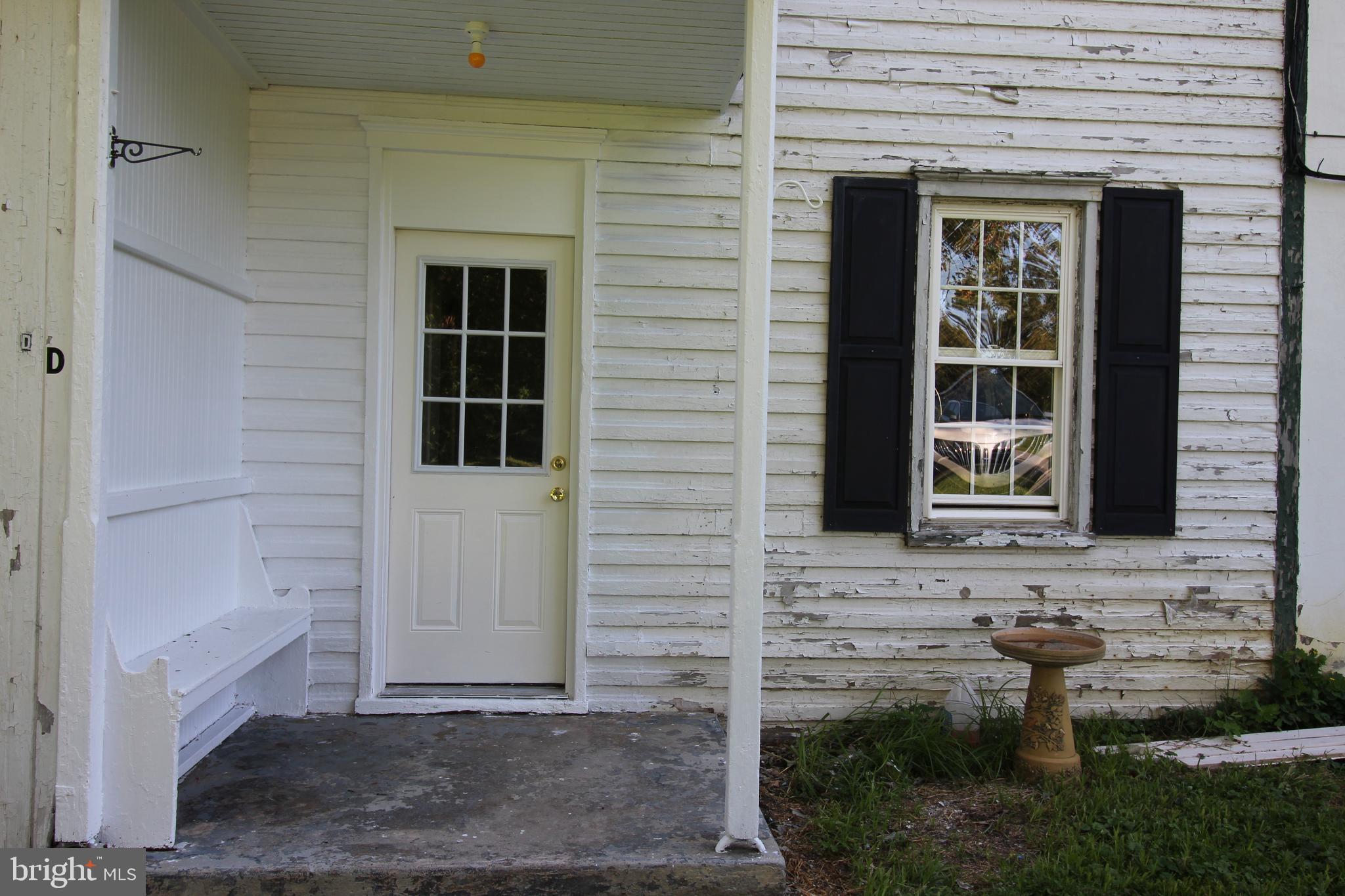 a front view of a house with a window