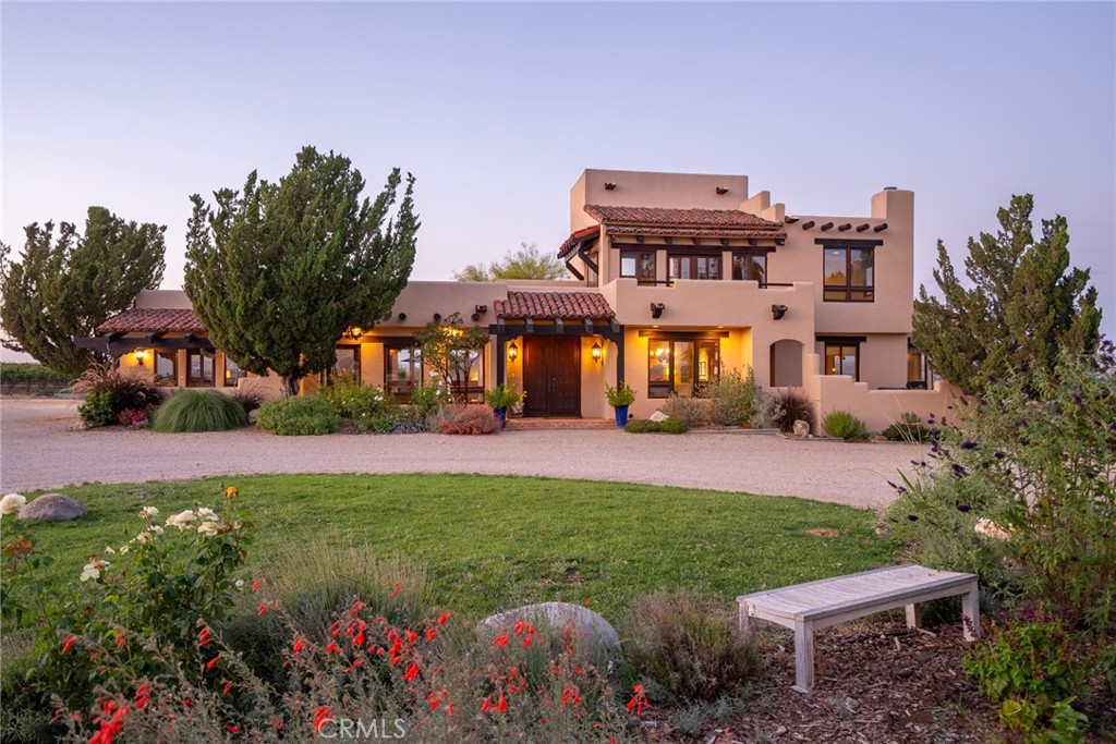 a view of a house with a garden