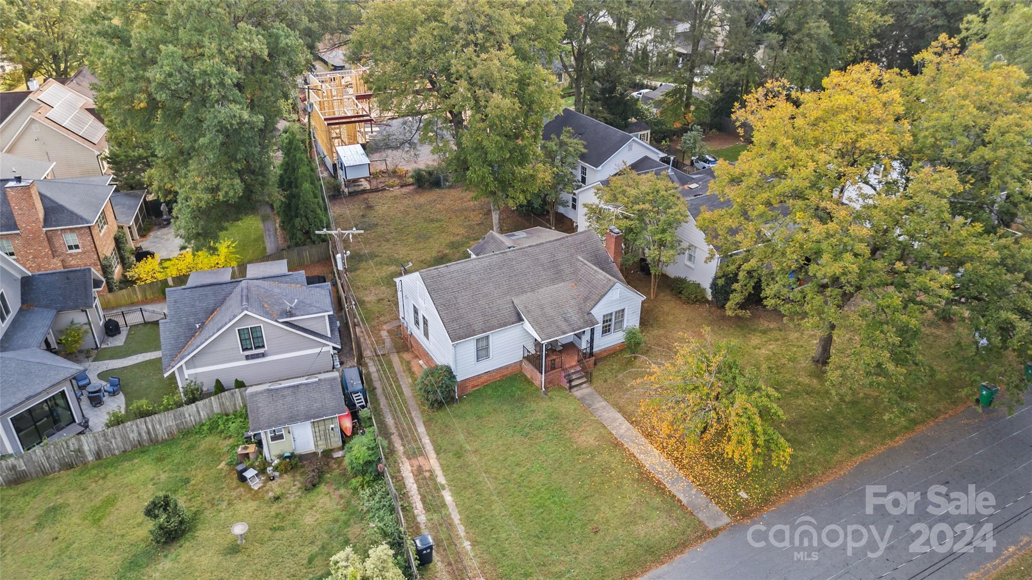 an aerial view of a house with a garden