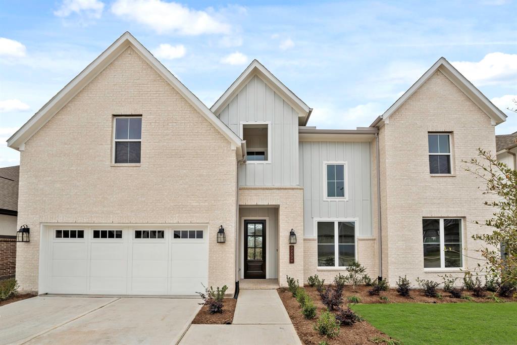 MOVE IN READY!! Westin Homes NEW Construction (Carter IX, Elevation KF) Two story. 5 bedrooms, 4.5 baths. Green grass added to enhance photo.