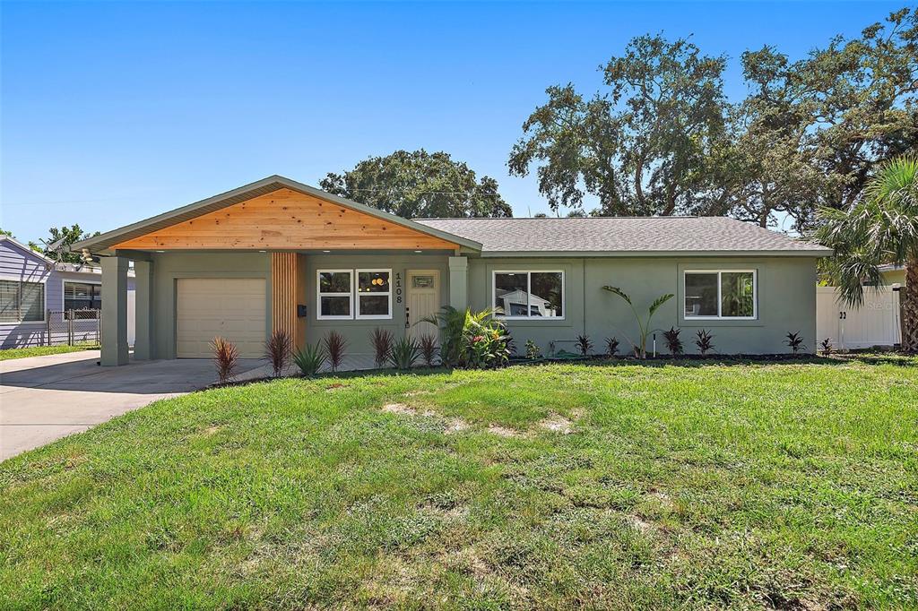 front view of a house and a yard