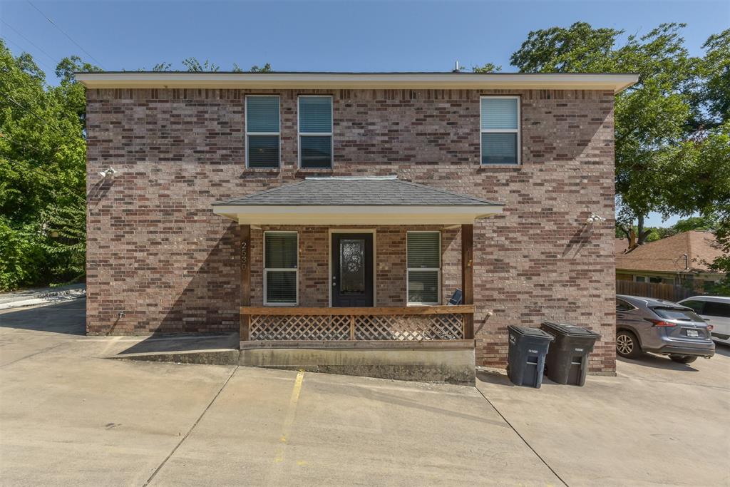 front view of a brick house with a window