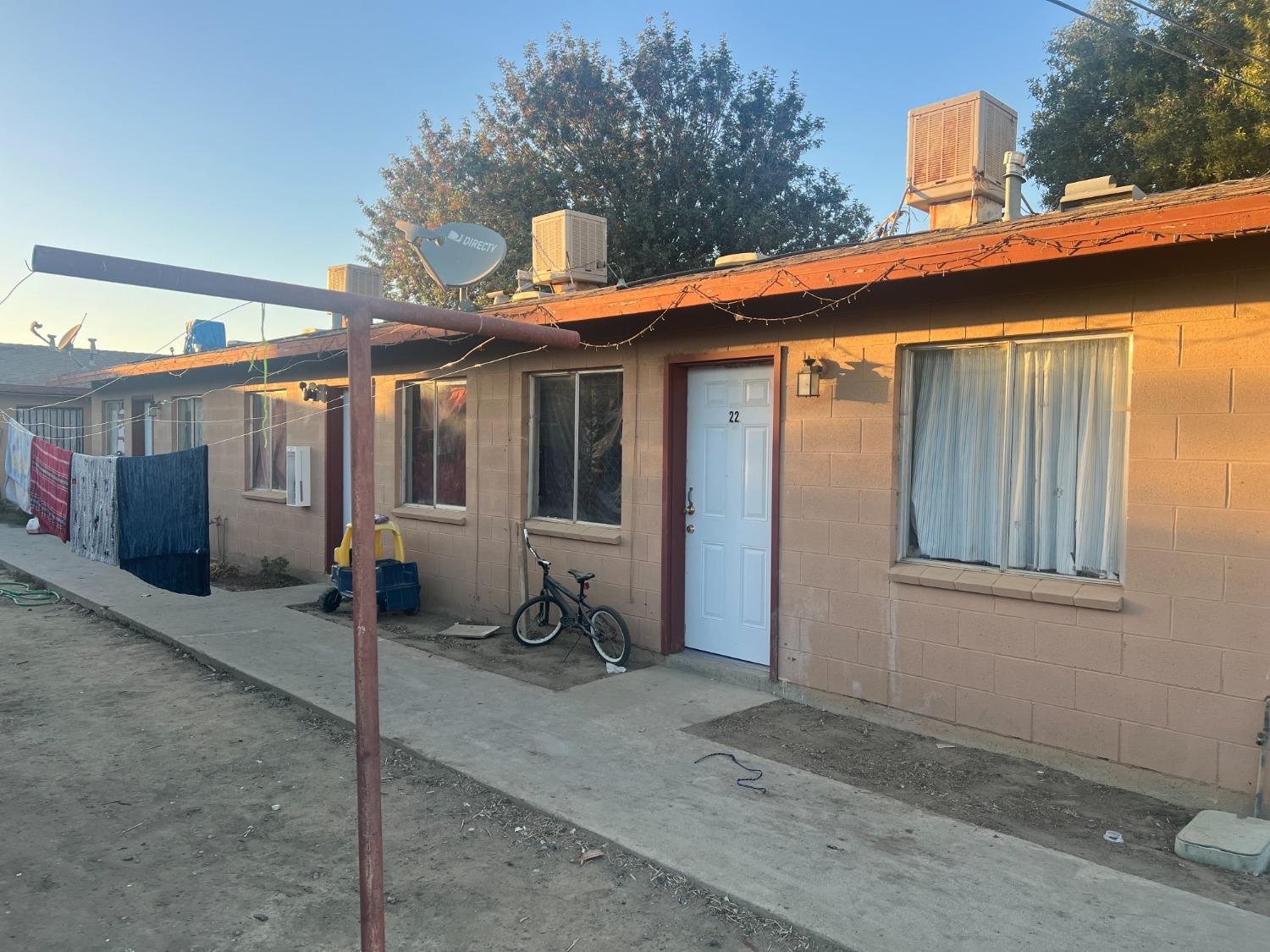 a front view of a house with yard