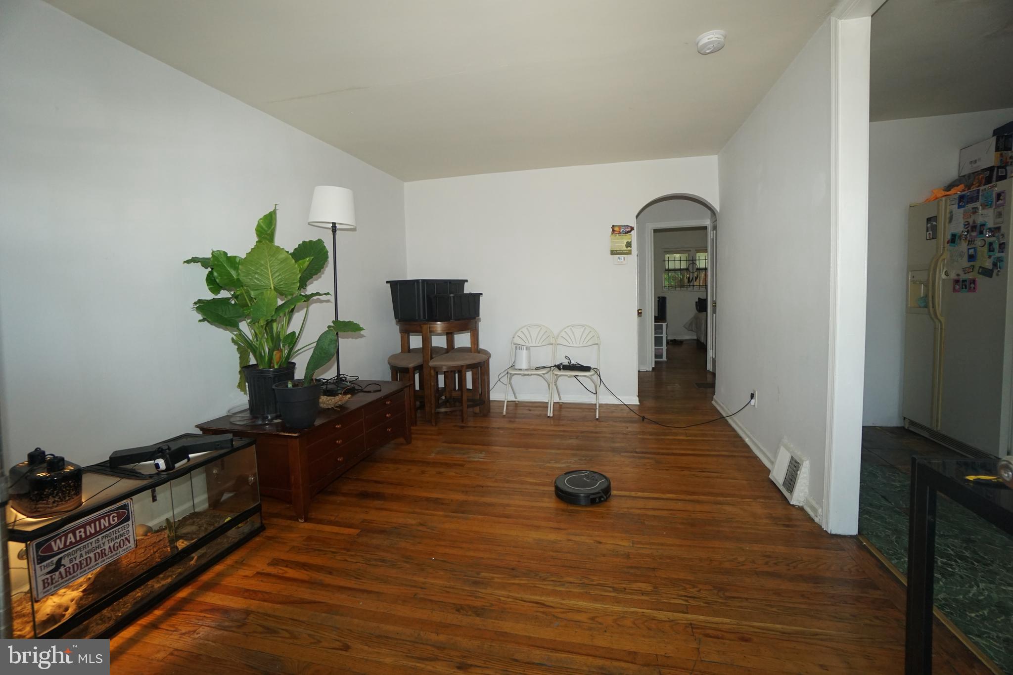 a view of a living room and dining room