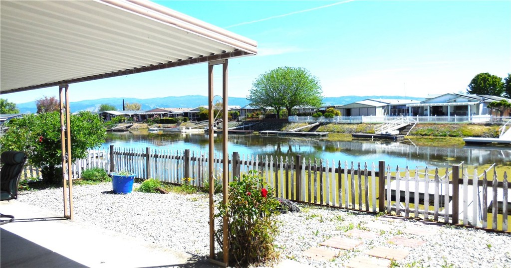 a house view with a lake view