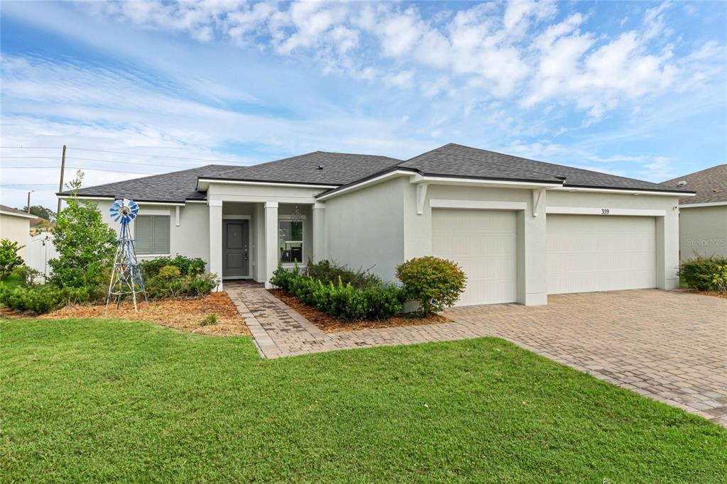 front view of house with a yard