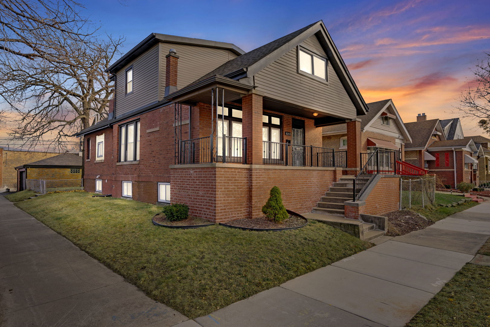 front view of a house with a yard