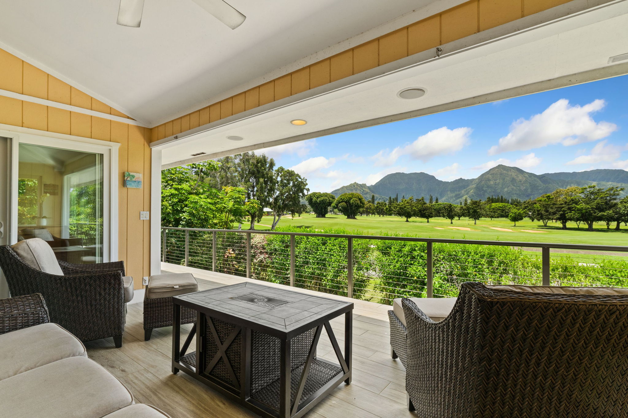 a view of a balcony with lake and mountain view