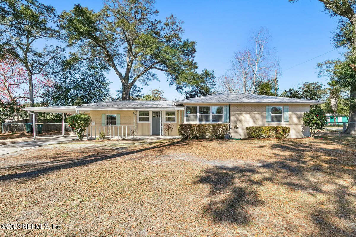 front view of a house with a patio