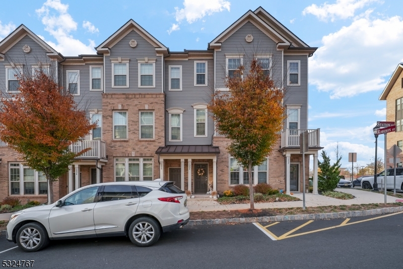 a car parked in front of a house