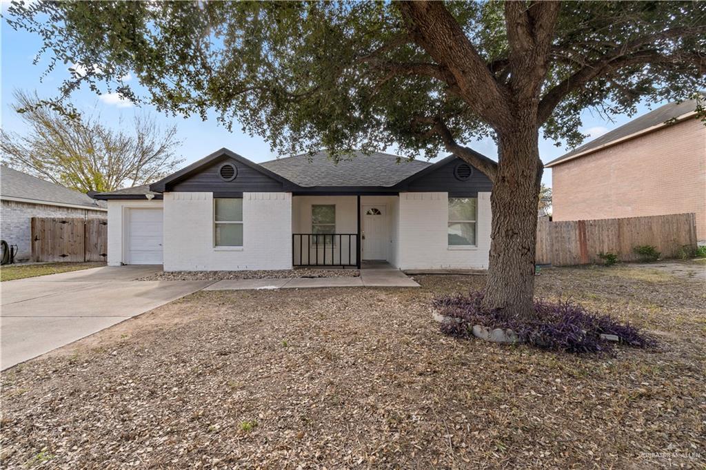 Ranch-style house featuring a garage