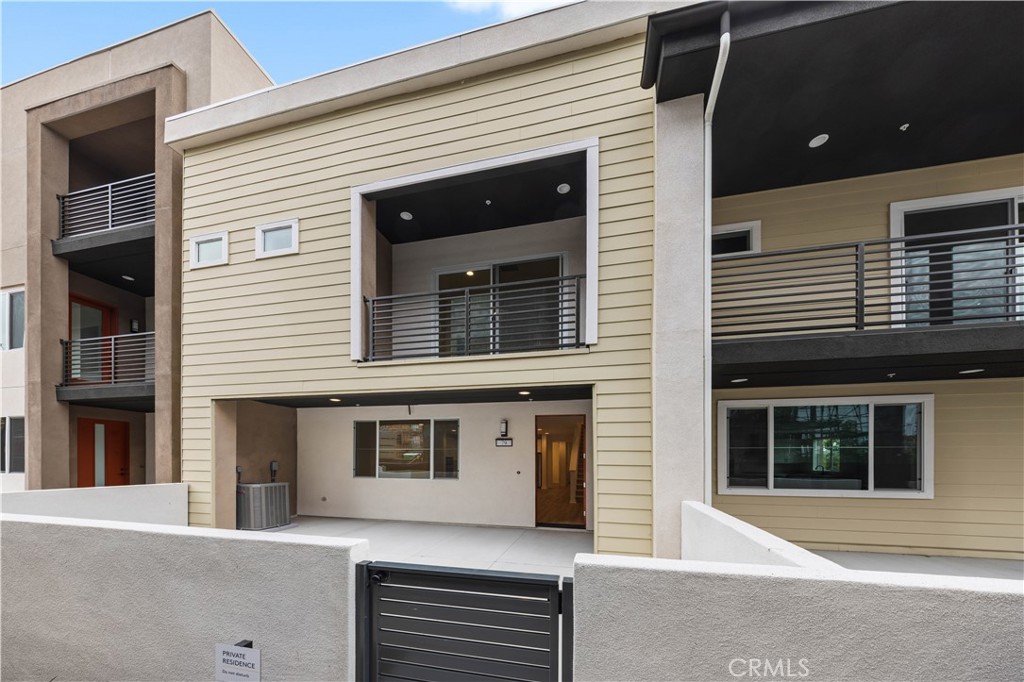 a front view of a house with a garage